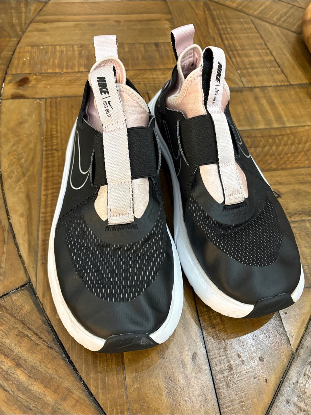 Nike Black and Light Pink Slip-On Sneakers